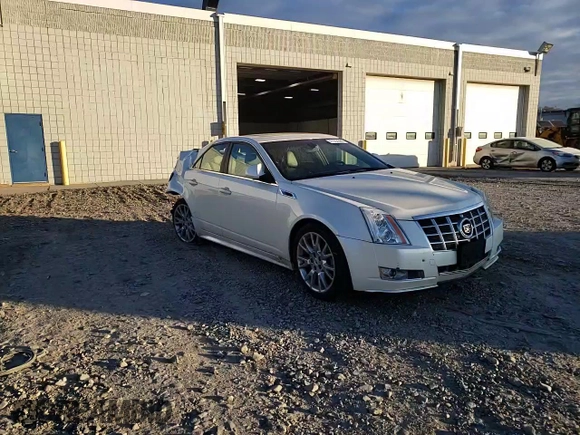2013 Cadillac CTS Premium z VIN 1G6DS5E3XD0101681, wystawiony jako Copart lot #41334385 z przebiegiem 49 646 mil mil oraz Szkoda całkowita • Salvage title. Historia ofert i sprzedaży dostępna na DreamBid. Obrazek 10.