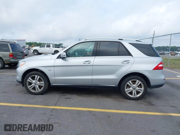2012 Mercedes-Benz M ML 350 with VIN 4JGDA5HB5CA012821, listed as a IAAI auction lot 42128070 with 94,749 mi miles. Bid and sale history available at carsss.com. Image 14.