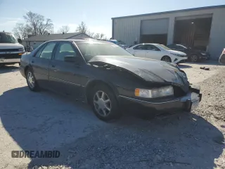 1996 Cadillac Seville Touring STS z VIN 1G6KY5299TU801228, wystawiony jako Copart lot #47304045 z przebiegiem Nie podano mil oraz Szkoda całkowita • Salvage title. Historia ofert i sprzedaży dostępna na DreamBid. Obrazek 4.