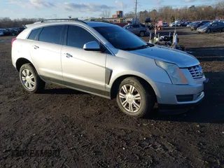 2014 Cadillac SRX with VIN 3GYFNAE32ES653170, listed as a IAAI auction lot 40982338 with 111,121 mi miles and . Bid and sale history available at DreamBid. Image 1.