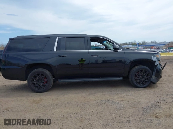 2017 Chevrolet Suburban LT with VIN 1GNSKHKCXHR194365, listed as a IAAI auction lot 42060690 with 213,424 mi miles and . Bid and sale history available at DreamBid. Image 13.