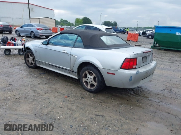 2001 Ford Mustang Deluxe z VIN 1FAFP44461F132453, wystawiony jako IAAI lot #42243068 z przebiegiem 183 171 mil mil oraz . Historia ofert i sprzedaży dostępna na DreamBid. Obrazek 3.