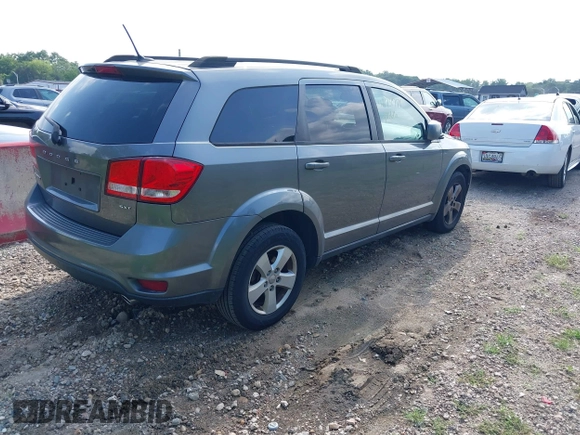 2012 Dodge Journey SXT with VIN 3C4PDCBG3CT310679, listed as a IAAI auction lot 42731771 with 165,928 mi miles and . Bid and sale history available at DreamBid. Image 4.