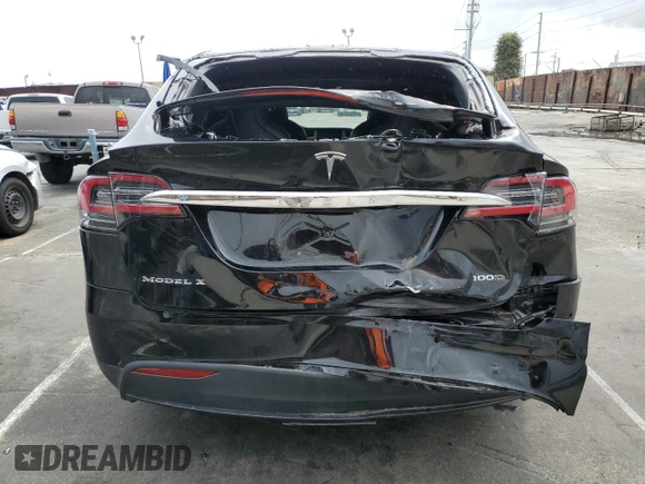2018 Tesla Model X 75D with VIN 5YJXCBE24JF130216, listed as a Copart auction lot 48894215 with 75,694 mi miles and Salvage Title. Bid and sale history available at carsss.com. Image 6.