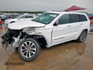 2018 Jeep Grand Cherokee Overland with VIN 1C4RJFCG0JC449114, listed as a Copart auction lot 54386655 with 59,366 mi miles and Salvage title. Bid and sale history available at DreamBid. Image 1.