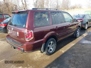 2007 Honda Pilot EX-L with VIN 5FNYF18647B004936, listed as a IAAI auction lot 41656465 with 225,580 mi miles and . Bid and sale history available at DreamBid. Image 4.