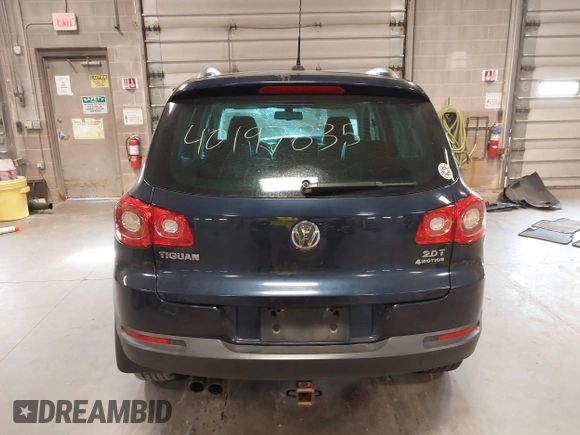 2011 Volkswagen Tiguan SE with VIN WVGBV7AXXBW533872, listed as a IAAI auction lot 40197835 with 104,685 mi miles and . Bid and sale history available at DreamBid. Image 16.
