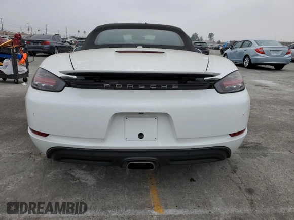 2019 Porsche 718 Boxster z VIN WP0CA2A80KS211040, wystawiony jako Copart lot #76409354 z przebiegiem 27 669 mil mil oraz Szkoda całkowita • Salvage title. Historia ofert i sprzedaży dostępna na DreamBid. Obrazek 6.