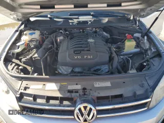 2014 Volkswagen Touareg Lux with VIN WVGEF9BP1ED012267, listed as a Copart auction lot 58924055 with 81,009 mi miles and Salvage title. Bid and sale history available at DreamBid. Image 12.