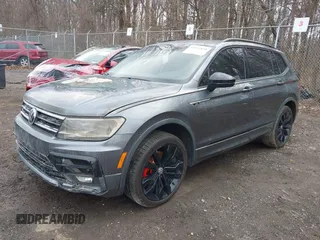 2021 Volkswagen Tiguan SE with VIN 3VV2B7AX5MM126415, listed as a IAAI auction lot 41811850 with Not Provided miles and . Bid and sale history available at DreamBid. Image 2.