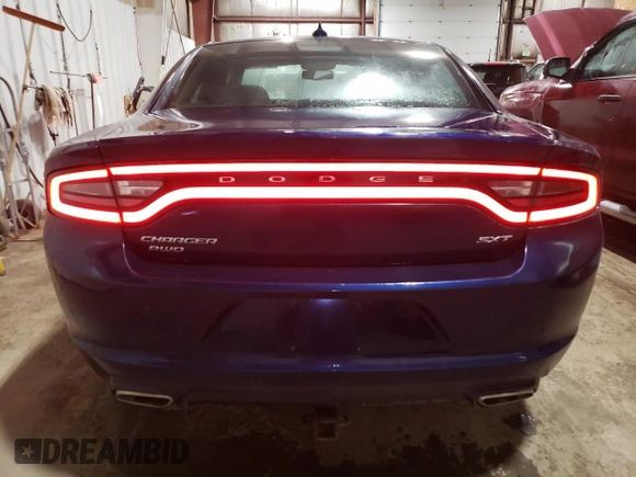 2015 Dodge Charger SXT z VIN 2C3CDXJG5FH810299, wystawiony jako Copart lot #55649945 z przebiegiem 135 864 mil mil oraz Szkoda całkowita • Salvage title. Historia ofert i sprzedaży dostępna na DreamBid. Obrazek 6.