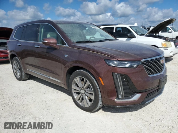 2022 Cadillac XT6 Premium Luxury with VIN 1GYKPDRS1NZ153516, listed as a Copart auction lot 75096064 with 12,604 mi miles and Non Repairable. Bid and sale history available at carsss.com. Image 4.
