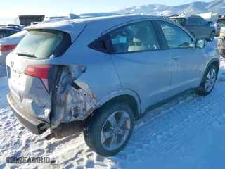 2016 Honda HR-V LX with VIN 3CZRU6H32GM732807, listed as a IAAI auction lot 41522896 with 136,074 mi miles. Bid and sale history available at carsss.com. Image 4.