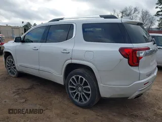 2021 GMC Acadia Denali with VIN 1GKKNPLS1MZ139821, listed as a IAAI auction lot 41455357 with 61,265 mi miles and . Bid and sale history available at carsss.com. Image 3.