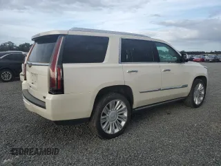 2015 Cadillac Escalade Platinum z VIN 1GYS4PKJ5FR574930, wystawiony jako Copart lot #74691204 z przebiegiem Nie podano mil oraz Szkoda całkowita • Salvage title. Historia ofert i sprzedaży dostępna na DreamBid. Obrazek 3.