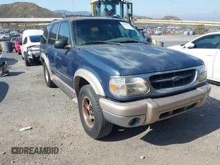 1999 Ford Explorer XLT z VIN 1FMZU34E0XZB83596, wystawiony jako IAAI lot #42431102 z przebiegiem 122 701 mil mil oraz . Historia ofert i sprzedaży dostępna na DreamBid. Obrazek 1.