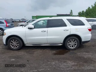 2013 Dodge Durango Crew with VIN 1C4RDJDG9DC667338, listed as a IAAI auction lot 42639559 with 137,020 mi miles and . Bid and sale history available at DreamBid. Image 14.