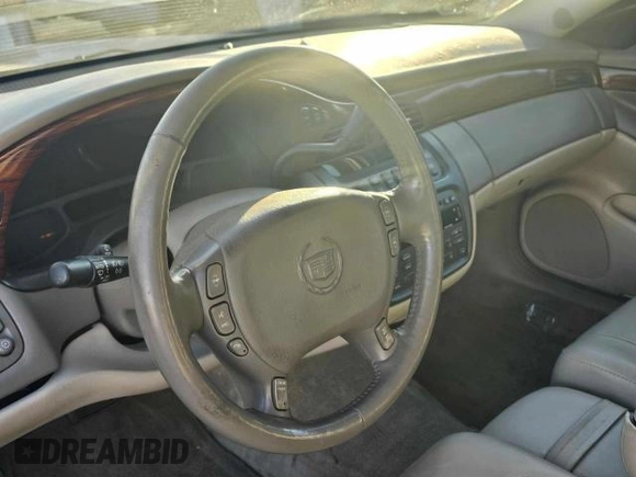 2004 Cadillac DeVille z VIN 1G6KD54Y64U133194, wystawiony jako Copart lot #82262914 z przebiegiem 148 721 mil mil oraz Czysty tytuł • Clean title. Historia ofert i sprzedaży dostępna na DreamBid. Obrazek 9.