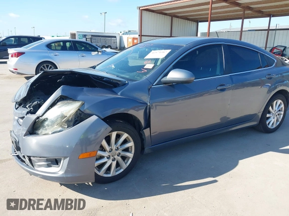 2011 Mazda 6 i Grand Touring with VIN 1YVHZ8CHXB5M27937, listed as a IAAI auction lot 42574587 with 203,952 mi miles and . Bid and sale history available at DreamBid. Image 18.