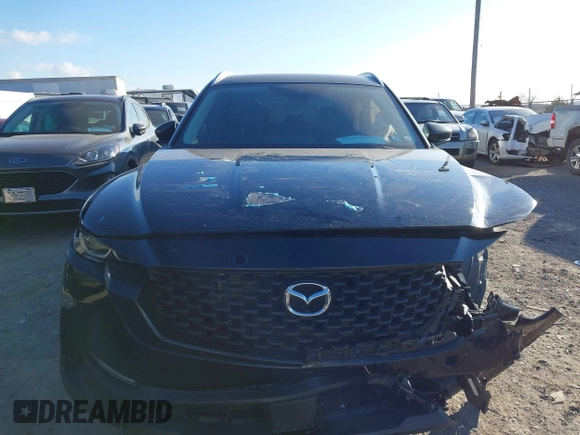 2023 Mazda CX-50 2.5 S Preferred Plus Package with VIN 7MMVABCM0PN138180, listed as a IAAI auction lot 41875179 with 33,652 mi miles. Bid and sale history available at carsss.com. Image 12.