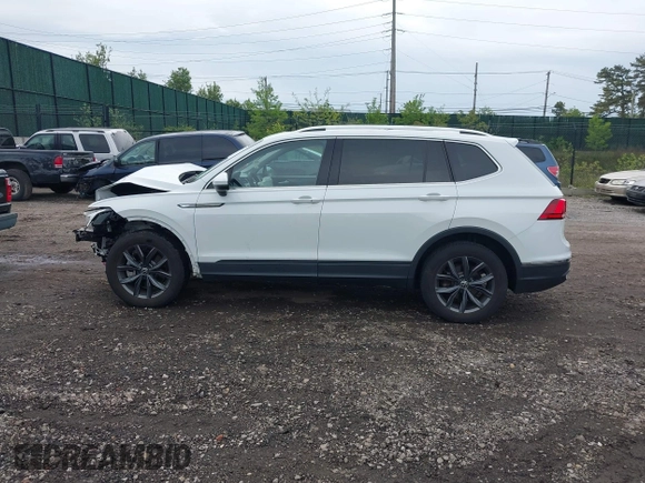2022 Volkswagen Tiguan SE z VIN 3VV2B7AX8NM109450, wystawiony jako IAAI lot #42248707 z przebiegiem 18 603 mil mil oraz . Historia ofert i sprzedaży dostępna na DreamBid. Obrazek 14.
