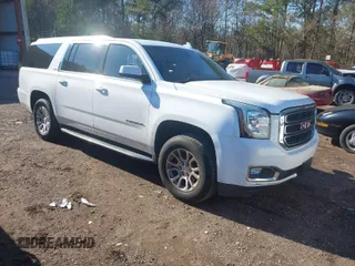 2016 GMC Yukon XL SLE with VIN 1GKS2FKC6GR458066, listed as a IAAI auction lot 41252794 with 168,606 mi miles. Bid and sale history available at carsss.com. Image 1.