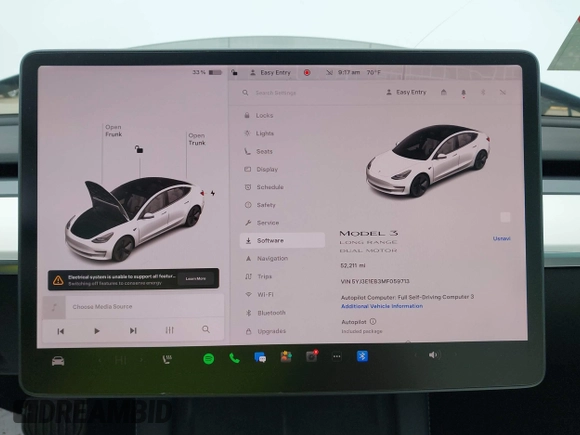 2021 Tesla Model 3 Long Range with VIN 5YJ3E1EB3MF059713, listed as a IAAI auction lot 41778289 with 52,211 mi miles. Bid and sale history available at carsss.com. Image 19.