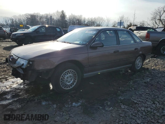 1989 Ford Taurus GL with VIN 1FABP52U1KA299938, listed as a Copart auction lot 86684144 with 52,675 mi miles and Salvage Title. Bid and sale history available at carsss.com. Image 1.