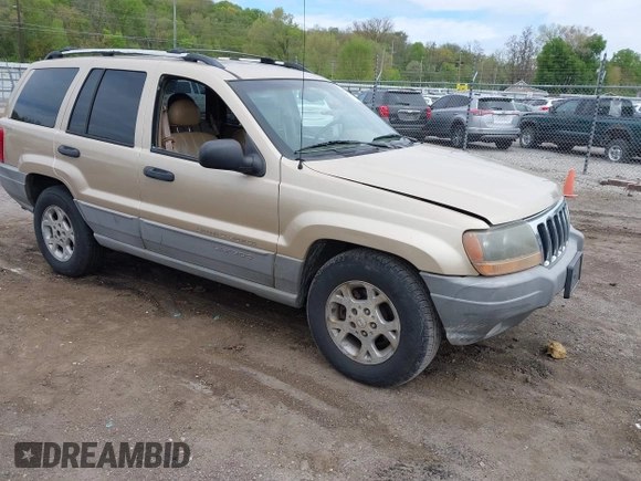 2000 Jeep Grand Cherokee Laredo with VIN 1J4GW48SXYC100248, listed as a IAAI auction lot 42182318 with 227,658 mi miles and . Bid and sale history available at DreamBid. Image 1.