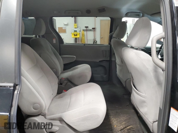 2016 Toyota Sienna LE with VIN 5TDJK3DC2GS129739, listed as a Copart auction lot 86125854 with 74,058 mi miles and Salvage Title. Bid and sale history available at carsss.com. Image 11.