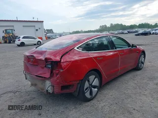 2018 Tesla Model 3 Long Range Battery z VIN 5YJ3E1EA9JF025942, wystawiony jako IAAI lot #42122703 z przebiegiem 84 453 mil mil oraz . Historia ofert i sprzedaży dostępna na DreamBid. Obrazek 4.
