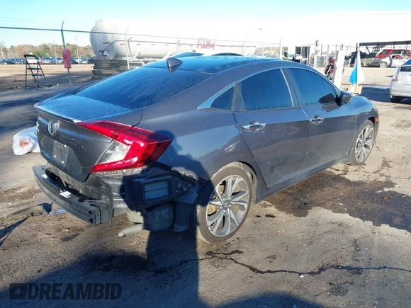 2020 Honda Civic Sedan Touring with VIN 19XFC1F97LE001901, listed as a IAAI auction lot 41048129 with 67,027 mi miles. Bid and sale history available at carsss.com. Image 4.