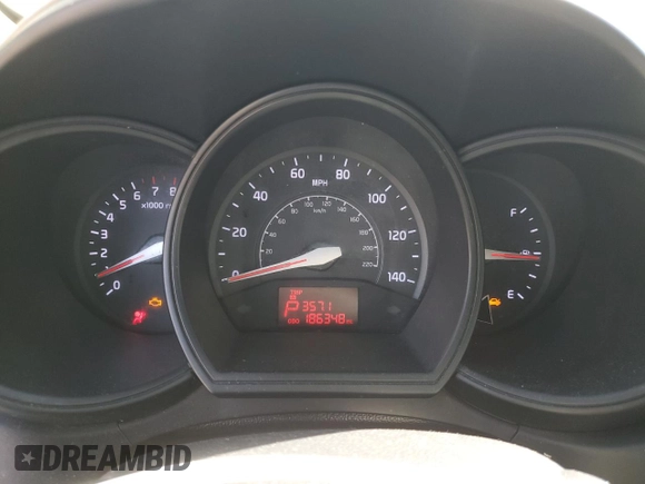 2012 Kia Rio LX with VIN KNADM5A3XC6015728, listed as a Copart auction lot 54952215 with 186,348 mi miles and Salvage Title. Bid and sale history available at DreamBid. Image 9.