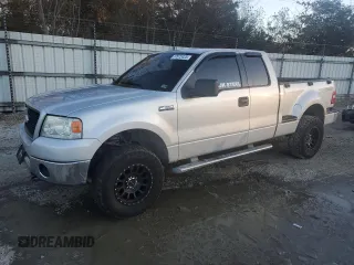 2006 Ford F-150 XLT with VIN 1FTPX04596KB93701, listed as a Copart auction lot 87672425 with 102,128 mi miles and Salvage title. Bid and sale history available at DreamBid. Image 1.