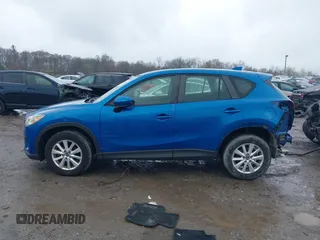 2014 Mazda CX-5 Sport with VIN JM3KE4BE6E0336504, listed as a IAAI auction lot 41961244 with 125,150 mi miles. Bid and sale history available at carsss.com. Image 15.