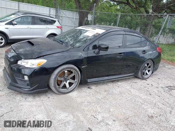2016 Subaru WRX with VIN JF1VA1B65G9801044, listed as a IAAI auction lot 41973939 with 82,420 mi miles. Bid and sale history available at carsss.com. Image 14.
