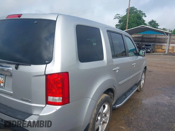 2015 Honda Pilot EX-L with VIN 5FNYF4H5XFB014653, listed as a IAAI auction lot 42121003 with 152,912 mi miles and . Bid and sale history available at carsss.com. Image 4.