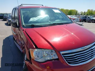 2014 Chrysler Town & Country Touring z VIN 2C4RC1BG7ER433956, wystawiony jako IAAI lot #42230097 z przebiegiem 107 737 mil mil oraz . Historia ofert i sprzedaży dostępna na DreamBid. Obrazek 19.
