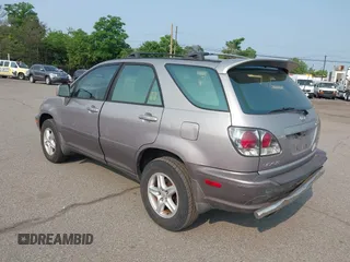 2001 Lexus RX 300 z VIN JTJHF10U910167787, wystawiony jako IAAI lot #42447267 z przebiegiem 165 671 mil mil oraz . Historia ofert i sprzedaży dostępna na DreamBid. Obrazek 3.