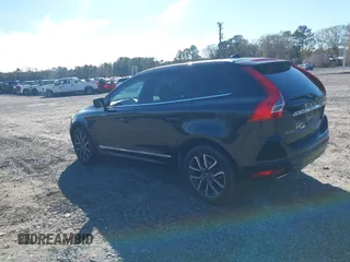 2016 Volvo XC60 T6 Drive-E z VIN YV449MDK0G2825672, wystawiony jako IAAI lot #41351214 z przebiegiem 140 633 mil mil oraz . Historia ofert i sprzedaży dostępna na DreamBid. Obrazek 3.