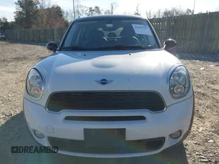2014 MINI Countryman S z VIN WMWZC5C57EWP38396, wystawiony jako IAAI lot #41027727 z przebiegiem 147 260 mil mil oraz . Historia ofert i sprzedaży dostępna na DreamBid. Obrazek 6.