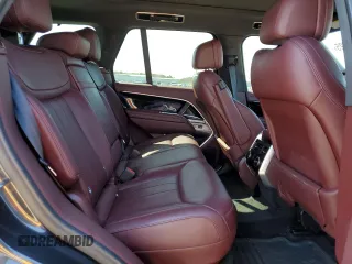 2023 Land Rover Range Rover SE z VIN SALKP9E75PA077913, wystawiony jako Copart lot #52419525 z przebiegiem 19 243 mil mil oraz Szkoda całkowita • Salvage title. Historia ofert i sprzedaży dostępna na DreamBid. Obrazek 11.