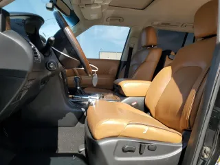 2016 Infiniti QX80 with VIN JN8AZ2ND4G9801512, listed as a Copart auction lot 51221605 with 162,774 mi miles and Clean Title. Bid and sale history available at carsss.com. Image 7.