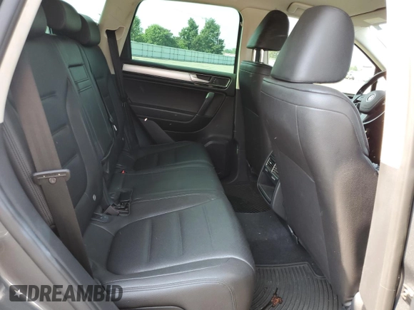 2015 Volkswagen Touareg Lux с VIN WVGEP9BP2FD004595, выставлен на аукционе Copart как лот 59020375 с пробегом 135 319 миль миль и Списание • Salvage title. История ставок и продаж доступна на DreamBid. Изображение 11.