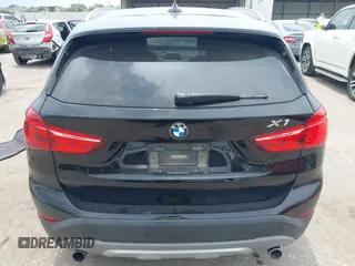 2017 BMW X1 xDrive28i with VIN WBXHT3Z34H4A53528, listed as a IAAI auction lot 42429800 with 75,986 mi miles and . Bid and sale history available at DreamBid. Image 16.