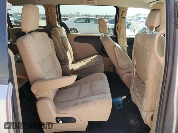 2014 Dodge Grand Caravan SXT with VIN 2C4RDGCG2ER273533, listed as a Copart auction lot 49228495 with 124,070 mi miles and Salvage Title. Bid and sale history available at DreamBid. Image 11.