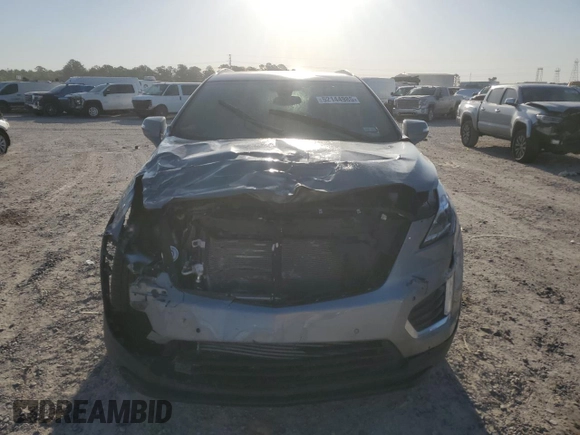 2023 Cadillac XT5 FWD Luxury z VIN 1GYKNAR49PZ174591, wystawiony jako Copart lot #52144985 z przebiegiem 20 005 mil mil oraz Szkoda całkowita • Salvage title. Historia ofert i sprzedaży dostępna na DreamBid. Obrazek 5.