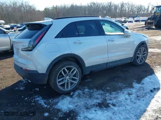 2019 Cadillac XT4 FWD Sport with VIN 1GYFZER49KF142425, listed as a IAAI auction lot 41416223 with 51,490 mi miles. Bid and sale history available at carsss.com. Image 4.