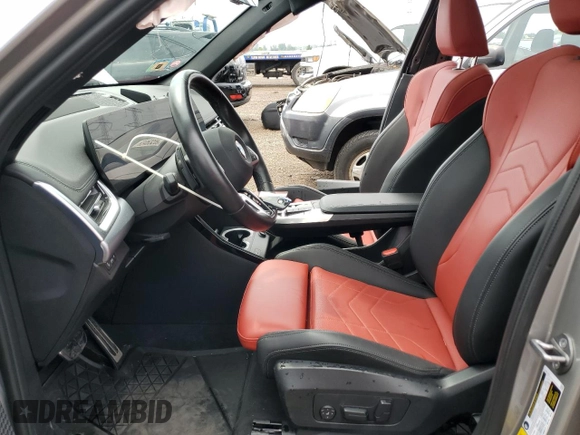 2023 BMW X1 xDrive28i with VIN WBX73EF07P5X69766, listed as a Copart auction lot 62490105 with 9,193 mi miles and Salvage title. Bid and sale history available at DreamBid. Image 7.