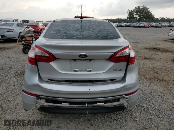2016 Ford Fiesta S z VIN 3FADP4AJXGM153848, wystawiony jako Copart lot #57865195 z przebiegiem 128 858 mil mil oraz Szkoda całkowita • Salvage title. Historia ofert i sprzedaży dostępna na DreamBid. Obrazek 6.